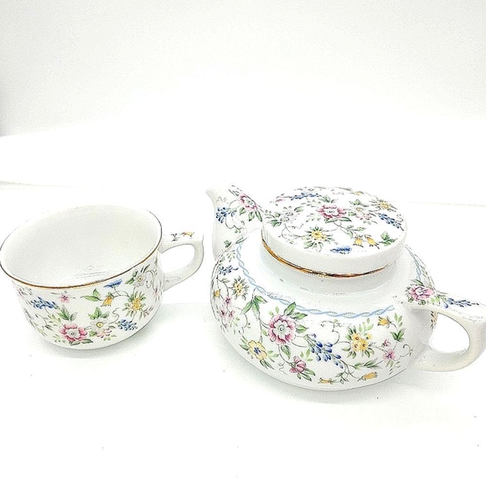 Vintage floral teapot and teacup set